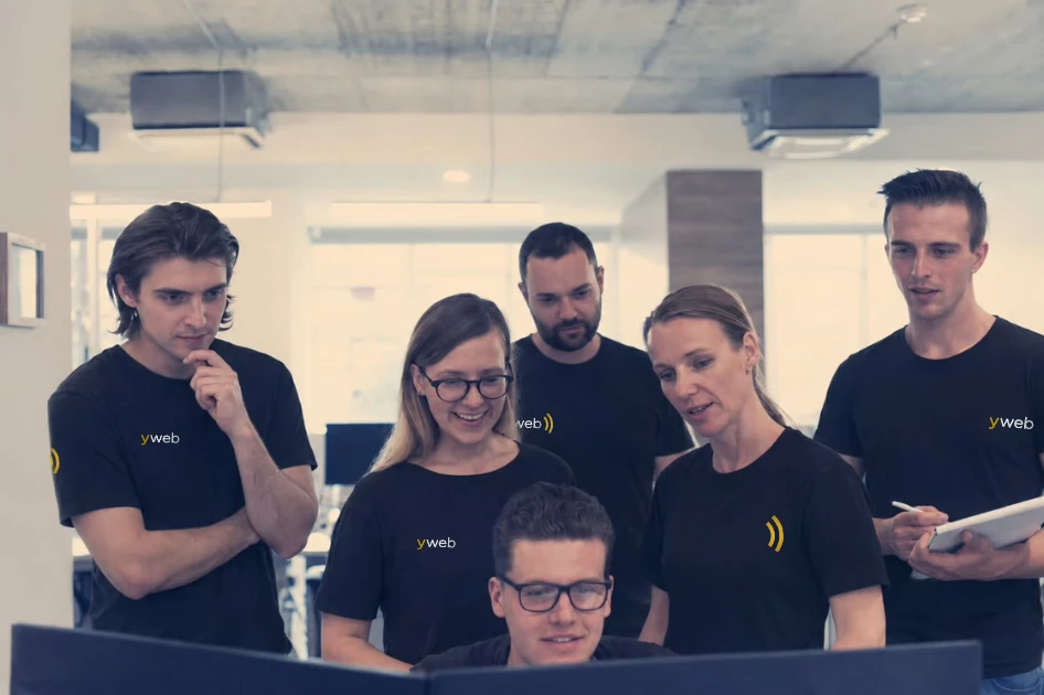 The YWeb team in their office